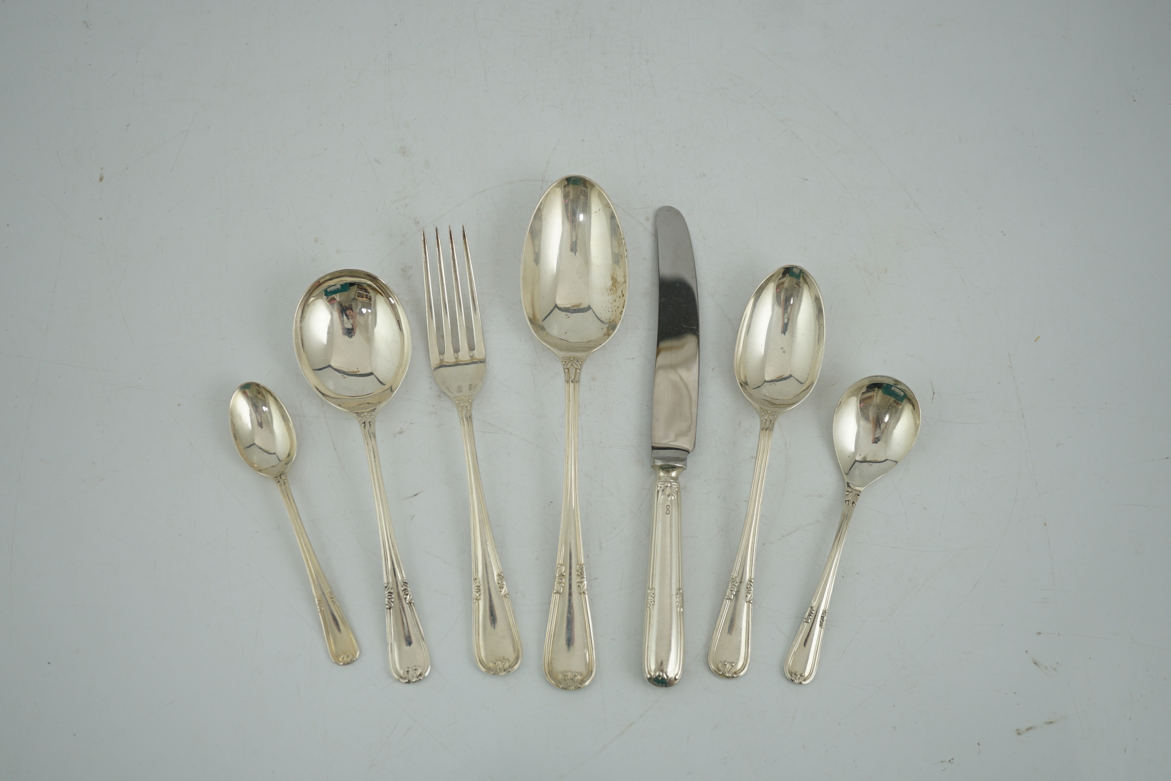 An Elizabeth II canteen of silver cutlery for six, by Walker & Hall